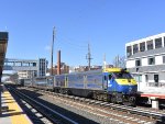 LIRR Oyster Bay to Jamaica Train # 6511 heads away from Mineola Station with the 422 pushing